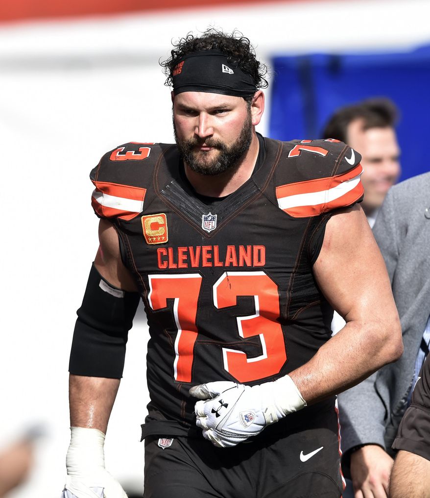 This Sunday, Oct. 22, 2017, photo shows Cleveland Browns tackle Joe Thomas leaving the field after getting hurt in the second half of an NFL football game against the Tennessee Titans, in Cleveland. The Browns are awaiting tests on Pro Bowl tackle Joe Thomas, whose season may be over because of a triceps injury. Thomas was hurt during the third quarter of Sunday's overtime loss to Tennessee, ending his streak of consecutive snaps at 10,363. He had been on the field for every offensive play of his career since 2007 before an injury that left teammates, fans and Titans players shaken. (AP Photo/David Richard)