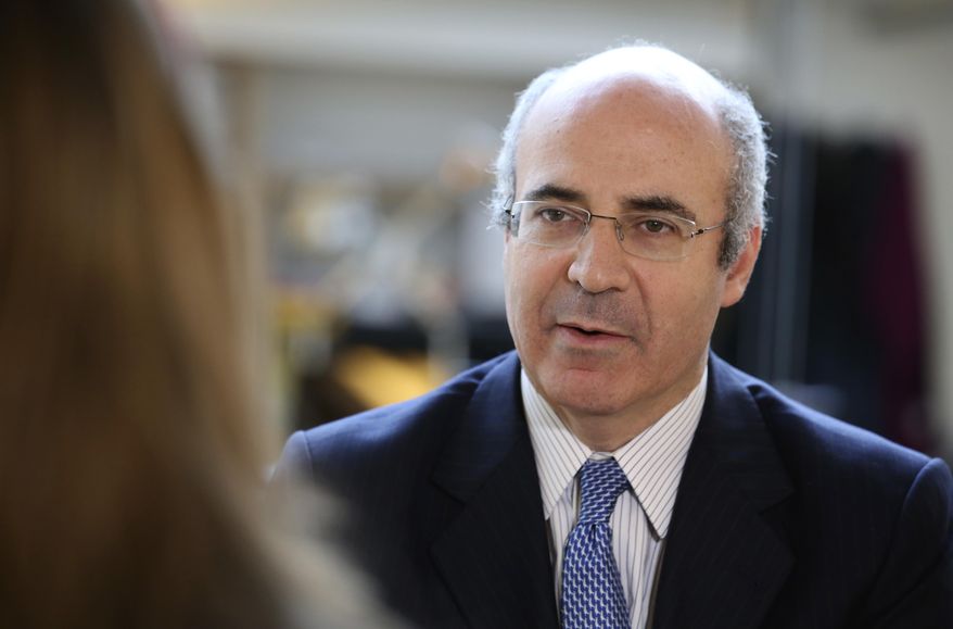 FILE - In this March 3, 2015 file photo, U.S-born businessman William Browder answers reporters during an interview with the Associated Press in Paris. Republican and Democratic lawmakers are asking the U.S. government to act after British-American financier William Browder said his visa was revoked. Browder lobbied for a law named after his former employee, Russian whistleblower Sergei Magnitsky, that imposed travel bans and asset freezes on dozens of Russian officials. (AP Photo/Remy de la Mauviniere)