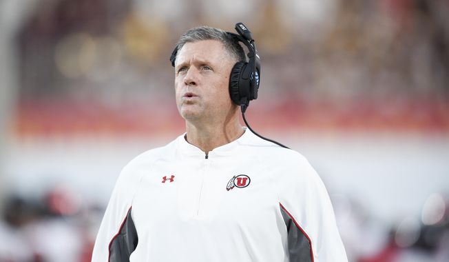 This Oct. 14, 2017 photo shows Utah head coach Kyle Whittingham looking on from the sidelines during the first half of an NCAA college football game against the Southern California in Los Angeles. Whittingham joked with his sports information director near the end of his weekly news conference, Monday, Oct. 23, 2017 saying, “Save me, Liz. Save me.” Things have fallen apart for Utah and there’s no clear explanation why. Whittingham has taken responsibility and said the coaches need to be better, but production has fallen off across the board. (AP Photo/Kelvin Kuo)