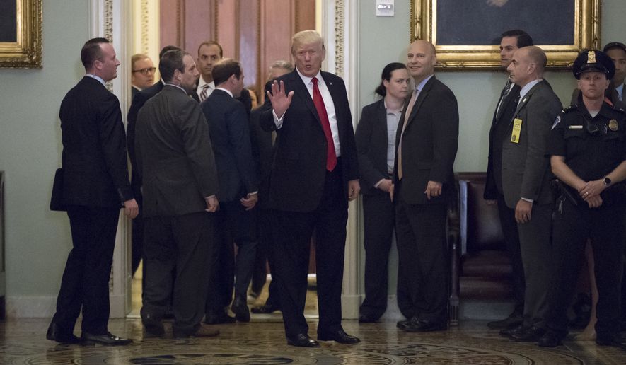 President Donald Trump leaves the Capitol after lunch with Senate Majority Leader Mitch McConnell, R-Ky., and Senate Republicans to talk about his tax reform agenda, in Washington, Tuesday, Oct. 24, 2017. (AP Photo/J. Scott Applewhite)