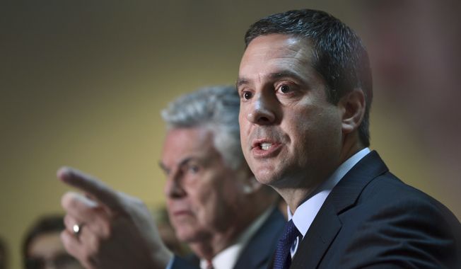 Rep. Devin Nunes (right), chairman of the House Permanent Select committee on intelligence, has widened the net in the panel&#x27;s investigation into the use of the unconfirmed Russia dossier against Donald Trump. (Associated Press/File)
