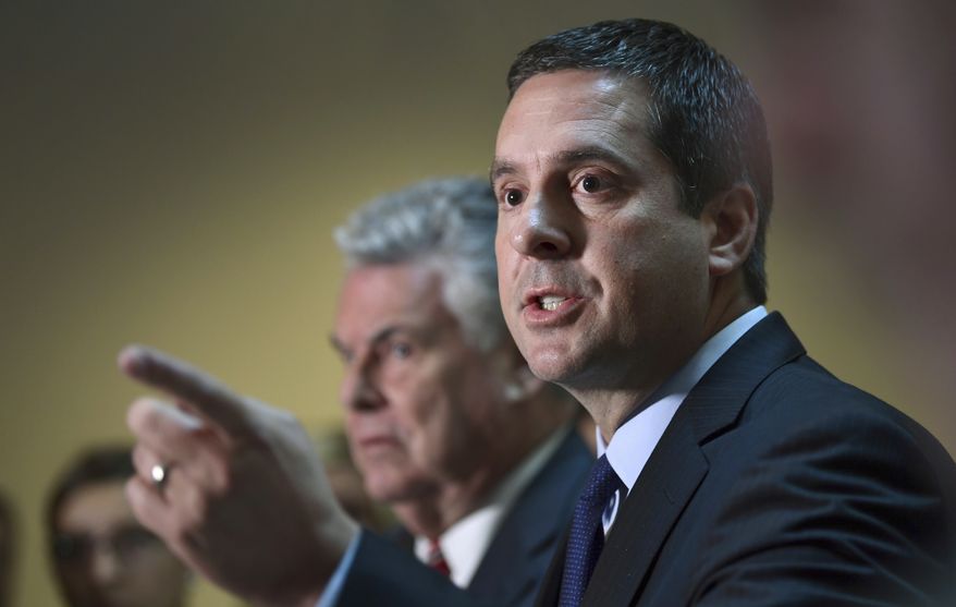 Rep. Devin Nunes (right), chairman of the House Permanent Select committee on intelligence, has widened the net in the panel&#39;s investigation into the use of the unconfirmed Russia dossier against Donald Trump. (Associated Press/File)