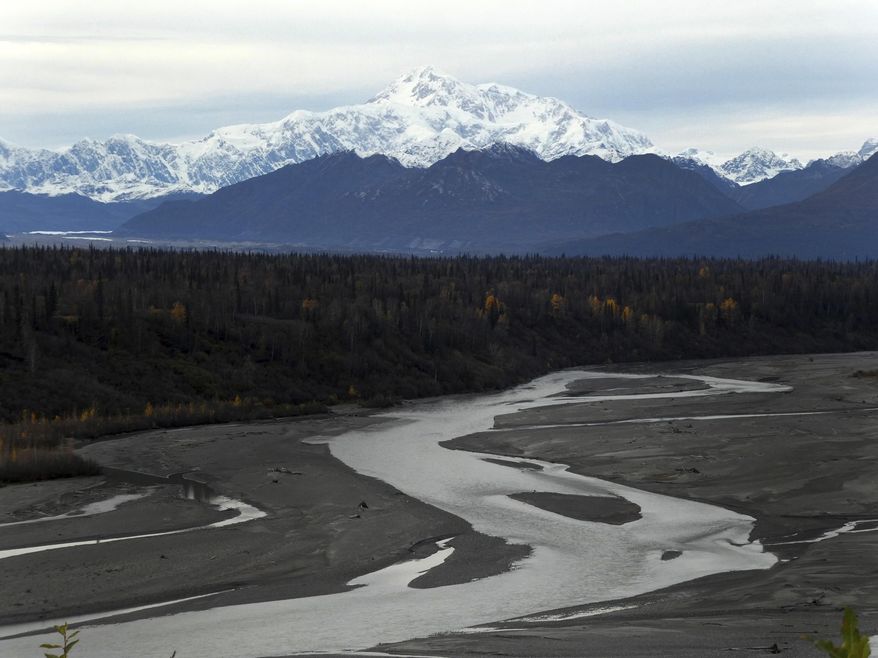 In this Sunday, Oct. 1, 2017 North America's tallest peak, Denali, is seen from a turnout in Denali State Park, Alaska. The peak was renamed from Mount McKinley to Denali under President Barack Obama. Alaska U.S. Sen. Dan Sullivan recently said he and Sen. Lisa Murkowski told President Donald Trump they support keeping the name Denali. (AP Photo/Becky Bohrer)