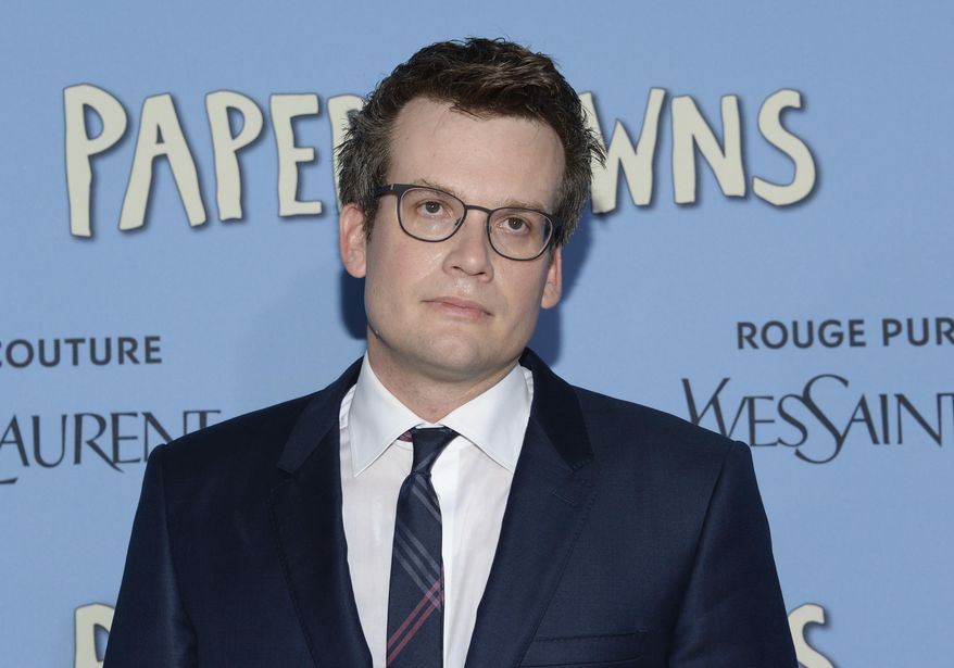 FILE - In this July 21, 2015, file photo, author John Green attends the premiere of "Paper Towns" in New York. Green’s new novel, “Turtles All The Way Down” centers around a 16-year-old girl with obsessive compulsive disorder, like Green himself, but she’s thrust into the role of a teen detective trying to locate a missing billionaire while falling for his son. (Photo by Evan Agostini/Invision/AP, File)