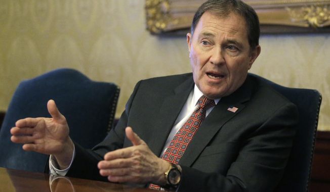 FILE - In this March 9, 2017, file photo, Utah Gov. Gary Herbert speaks during an interview at the Utah State Capitol in Salt Lake City. A state council studying changes to Utah's new law setting the country's strictest DUI threshold is backing away from recommending any changes, despite Herbert's wish to soften some penalties following a backlash from state's the hospitality and ski industry. (AP Photo/Rick Bowmer, File)