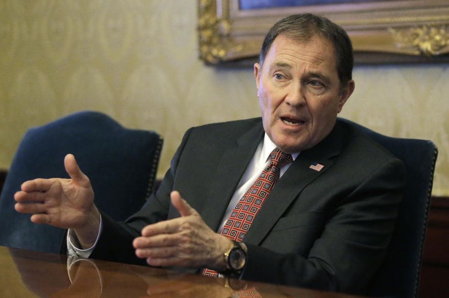 FILE - In this March 9, 2017, file photo, Utah Gov. Gary Herbert speaks during an interview at the Utah State Capitol in Salt Lake City. A state council studying changes to Utah's new law setting the country's strictest DUI threshold is backing away from recommending any changes, despite Herbert's wish to soften some penalties following a backlash from state's the hospitality and ski industry. (AP Photo/Rick Bowmer, File)