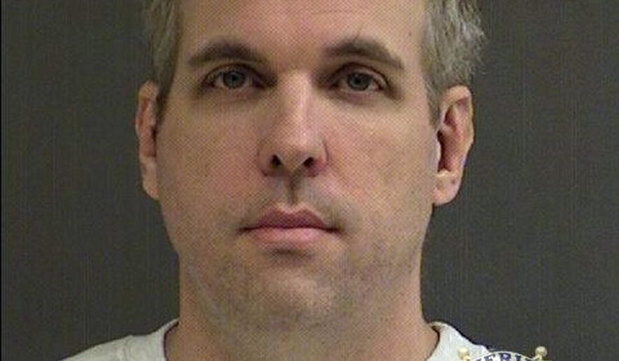 This undated photo provided by the Washington County Sheriff's office shows Toby Mendenhall. Authorities say Mendenhall who is accused of sexually abusing children in Oregon has been found in China and returned to the United States. The Washington County Sheriff's Office says the 41-year-old Mendenhall was booked into the county jail Tuesday, Oct. 24, 2017. (Washington County Sheriff's Office via AP)