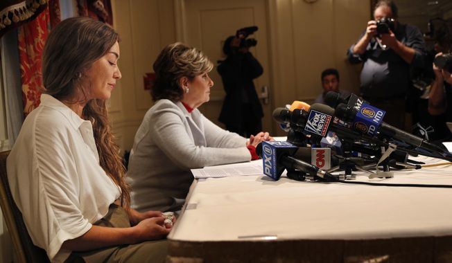 Mimi Haleyi, left, appears at a news conference with her attorney Gloria Allred in New York, Tuesday, Oct. 24, 2017. Haleyi alleges that Harvey Weinstein sexually assaulted her. Representatives for Weinstein did not immediately comment Tuesday. Weinstein has previously denied any non-consensual sexual encounters. (AP Photo/Seth Wenig)