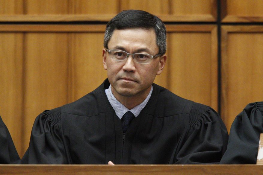 FILE - This Dec. 2015 file photo shows U.S. District Judge Derrick Watson in Honolulu. The Trump administration Tuesday, Oct. 24, 2017, is appealing Watson's order that blocks the newest version of the travel ban. Watson put President Donald Trump's latest set of restrictions on hold just hours before they were to take effect last week, ruling that the policy has the same problems as its predecessor. (George Lee /The Star-Advertiser via AP, File)