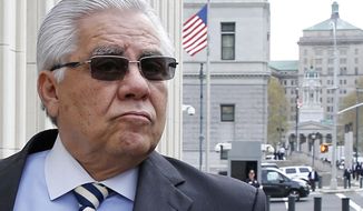 Hector Trujillo, a former judge and former secretary general of the Guatemalan soccer federation, enters Federal Court in Brooklyn for the sentencing phase of his trial in connection with a global FIFA soccer probe, Wednesday, Oct. 25, 2017, in New York. Trujillo pleaded guilty to wire fraud and conspiracy in June. (AP Photo/Kathy Willens)