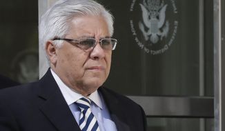 FILE - In this June 2, 2017, file photo, former Guatemalan judge Hector Trujillo leaves Brooklyn federal court after pleading guilty in New York. Trujillo, a former judge who led Guatemala&#x27;s soccer federation, is set to be the first person sentenced in the U.S. in the world soccer scandal. He is scheduled to be sentenced on Wednesday, Oct. 25, in federal court in the Brooklyn Borough of New York. Trujillo pleaded guilty to wire fraud and conspiracy in June. (AP Photo/Mark Lennihan, File)