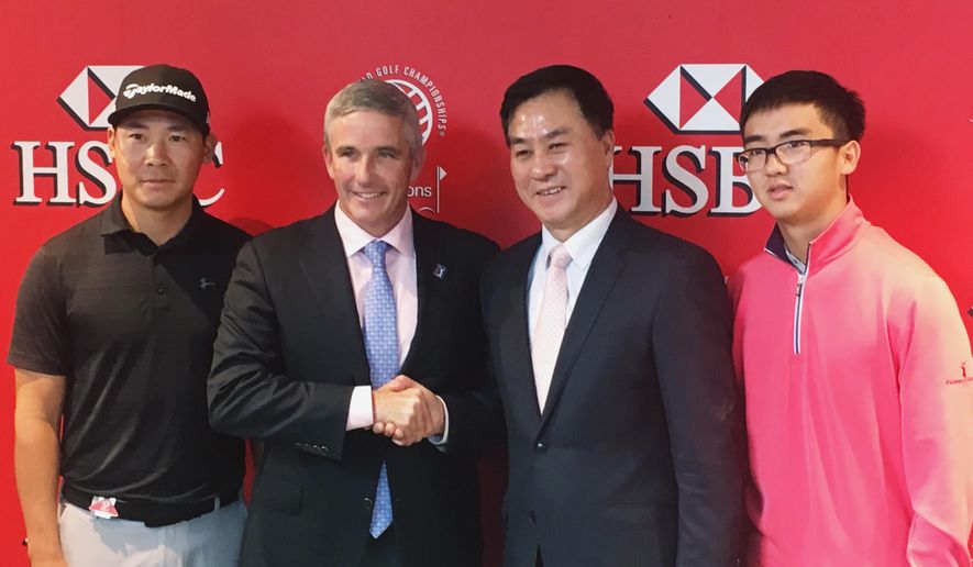 PGA Tour commissioner Jay Monahan, center left, shakes hands with Zhang Xiaoning, president of the China Golf Association, after announcing a deal at the WGC-HSBC Champions golf tournament in Shanghai on Wednesday, Oct. 25, 2017, to resume the PGA Tour China Series. They are flanked by Zhang Xinjun, far left, and Dou Zecheng, who used the China series as a springboard to become the first Chinese players to earn full PGA Tour cards. (AP Photo/Doug Ferguson) **FILE**