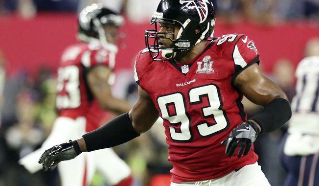 FILE - In this Feb. 5, 2017, file photo, Atlanta Falcons' Dwight Freeney follows the action against the New England Patriots during the NFL football's Super Bowl 51 in Houston. Freeney is back in the NFL after agreeing to a deal to join the Seattle Seahawks. The 37-year-old has been without a job after spending last season with Atlanta. He'll be used as a pass rusher with Seattle after the loss of Cliff Avril to a neck injury. (AP Photo/Gregory Payan, File)