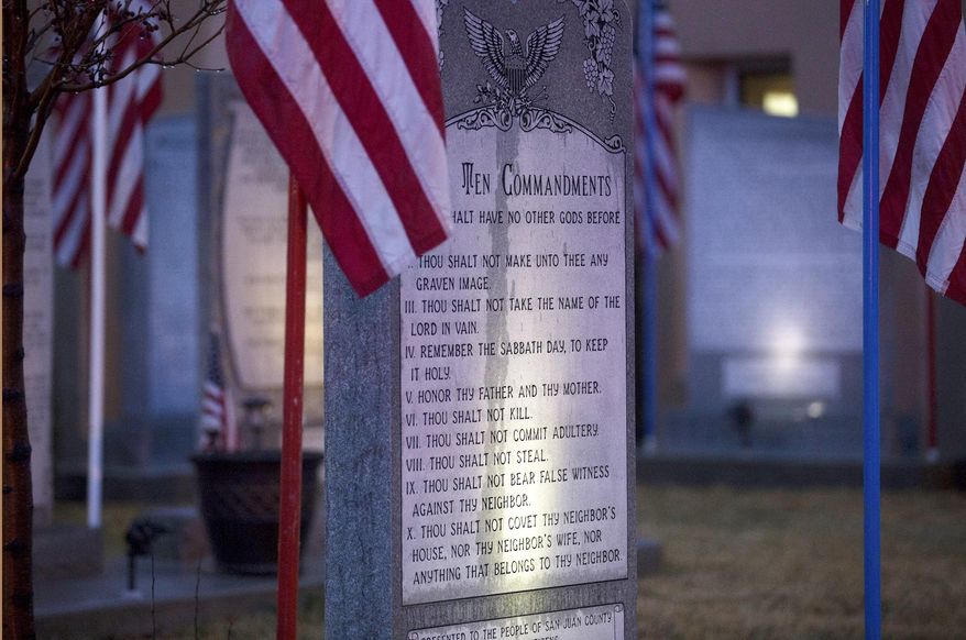 The Bloomfield Ten Commandments memorial is pictured, Monday, Feb. 13, 2017 at Bloomfield City Hall in Bloomfoeld,, N.M The U.S. Supreme Court on Monday, Oct. 16, 2017, sided with a lower court, the the 10th U.S. Circuit Court of Appeals, that ordered Bloomfield to remove a Ten Commandments monument from the lawn outside City Hall. (Jon Austria/The Daily Times via AP)