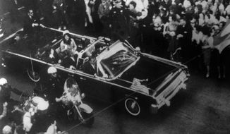 This image provided by the Warren Commission is  an overhead view of President John F. Kennedy&#39;s car in Dallas motorcade on Nov. 22, 1963, and was the commission&#39;s Exhibit No. 698. Special agent Clinton J. Hill is shown riding atop the rear of the limousine. President Donald Trump is caught in a push-pull on new details of Kennedy’s assassination, jammed between students of the killing who want every scrap of information and intelligence agencies that are said to be counseling restraint.  How that plays out should be known on Oct. 26, 2017, when long-secret files are expected to be released. (Warren Commission via AP)