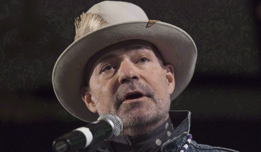 FILE - In this Dec. 6, 2016 file photo, Gord Downie speaks during a ceremony honoring him at the AFN Special Chiefs assembly in Gatineau, Quebec, Canada. Downie was blessed with the chance to say goodbye and he makes the most of that opportunity on “Introduce Yerself,” a 23-song farewell to friends, family, bandmates and others which leaves a lump in your throat and a smile on your face. Downie died at age 53 on Oct. 17, 2017, about 18 months after his illness was revealed. (Adrian Wyld/The Canadian Press via AP)
