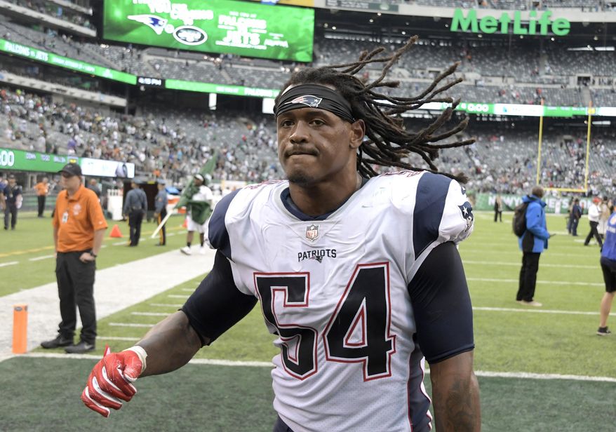 FILE - In this Oct. 15, 2017, file photo, New England Patriots middle linebacker Dont'a Hightower (54) walks off the field after the Patriots defeated the New York Jets 24-17 in an NFL football game in East Rutherford, N.J. A person familiar with the situation says the Hightower will miss Sunday’s game against the Los Angeles Chargers and is facing season-ending surgery on his right shoulder. The surgery will be for a torn pectoral muscle, the person told The Associated Press on the condition of anonymity Thursday, Oct. 26, 2017, because it has not yet been announced by the team. (AP Photo/Bill Kostroun, File)