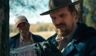This image released by Netflix shows David Harbour in a scene from &amp;quot;Stranger Things,&amp;quot; premiering its second season on Friday. (Netflix via AP)