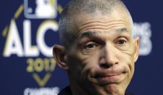 FILE - In this Oct. 12, 2017, file photo, New York Yankees manager Joe Girardi talks before batting practice for Game 1 of the American League Championship Series against the Houston Astros, in Houston. The New York Yankees announced Thursday, Oct. 26, 2017, that Girardi will not return to the team in the 2018 season. The announcement was made by Yankees Senior Vice President and General Manager Brian Cashman. (AP Photo/David J. Phillip, File)