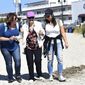 In this Thursday, Sept. 21, 2017 photo, Odette Swan, center, is helped onto the beach at Ocean City, N.J., by her granddaughter, Samantha Jonsson, left, and Pine Run nurse, Laura Watson. The trip was planned by Pine Run staff to help rekindle memories of dementia patients by taking them to and old familiar place from their past. (Art Gentile/The Intelligencer via AP)