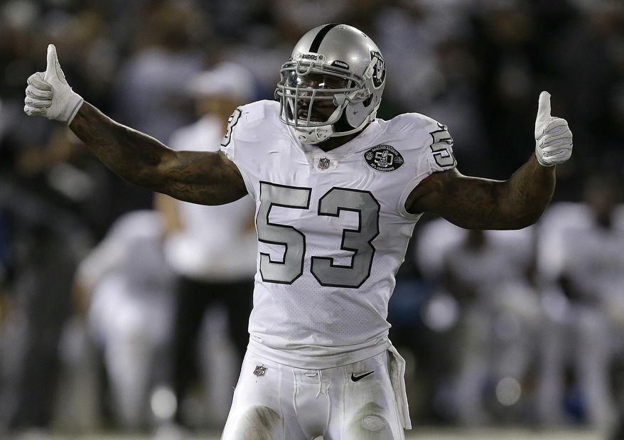 FILE - In this Thursday, Oct. 19, 2017 file photo, Oakland Raiders linebacker NaVorro Bowman gestures during the second half against the Kansas City Chiefs in an NFL football game in Oakland, Calif. When NaVorro Bowman joined the Oakland Raiders days after being let go in a youth movement in San Francisco he made a proclamation. "I'm only 29 years old and I still have a lot of juice left in me," he said. Players at ages once considered to be their prime playing years now struggle to find jobs as the NFL has undergone a dramatic youth movement in the past decade as teams grow more inclined to go with cheaper more inexperienced players ahead of seasoned veterans. (AP Photo/Ben Margot, File)