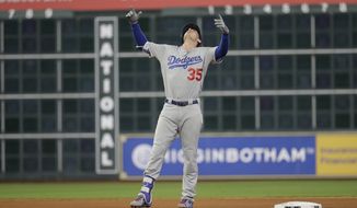 Los Angeles Dodgers&#39; Cody Bellinger reacts after hitting a double during the seventh inning of Game 4 of baseball&#39;s World Series against the Houston Astros Saturday, Oct. 28, 2017, in Houston. (AP Photo/David J. Phillip)