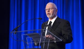File-This May 12, 2014, file photo shows Paul Singer, founder and CEO of hedge fund Elliott Management Corporation, speaking at the Manhattan Institute for Policy Research Alexander Hamilton Award Dinner, in New York. A conservative website with strong ties to the Republican establishment first retained the firm that investigated Donald Trump’s past, and ultimately produced a dossier that alleged a compromised relationship between the president and the Kremlin. The Washington Free Beacon on Friday. Oct. 27, 2017, confirmed it had originally funded research compiled by the firm Fusion GPS. But leaders from the Free Beacon, which is funded in large part by the Republican donor Singer, insisted that none of the early research it received appears in the dossier released later in the year detailing explosive allegations, many uncorroborated, about Trump compiled by a former British spy.(AP Photo/John Minchillo, File)
