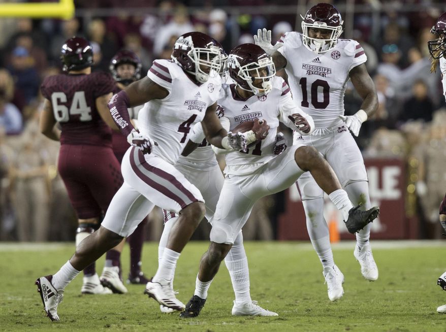 Mississippi State defensive back Mark McLaurin (41) reacts after making an interception against Texas A&M during the second quarter of an NCAA college football game on Saturday, Oct. 28, 2017, in College Station, Texas. (AP Photo/Sam Craft)