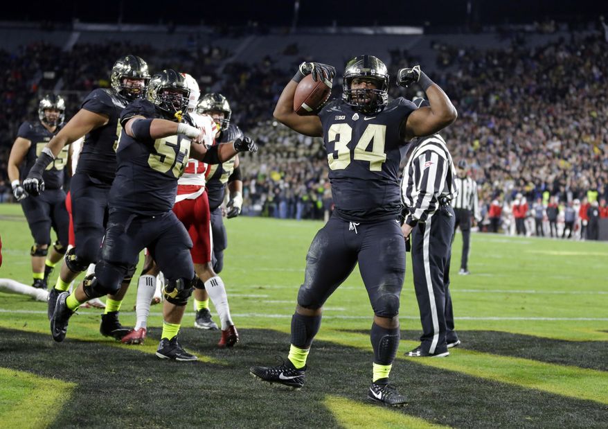 Purdue running back Richie Worship (34) celebrates a touchdown against Nebraska during the first half of an NCAA college football game in West Lafayette, Ind., Saturday, Oct. 28, 2017. (AP Photo/Michael Conroy)