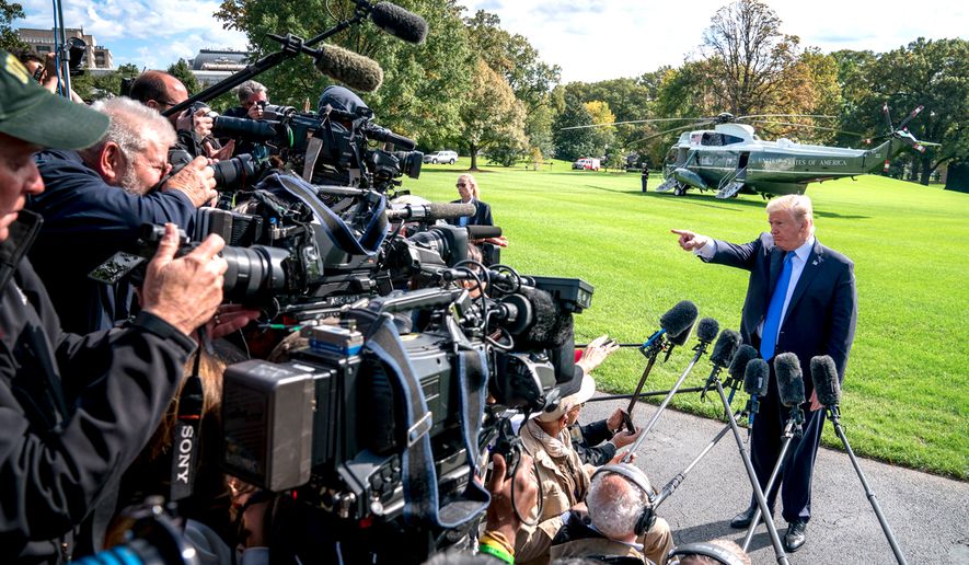 President Trump faces the press before boarding Marine One on the South Lawn of the White House last week. (AP Photo/Andrew Harnik)

