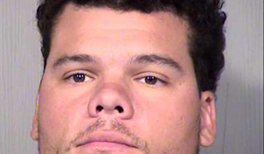This Oct. 28, 2017 photo provided by the Maricopa County Sheriff&#39;s office shows Oakland Athletics catcher Bruce Maxwell after his arrest on suspicion of aggravated assault and disorderly conduct. Scottsdale, Ariz., police say Maxwell pointed a handgun at the head of a woman in Scottsdale who had delivered food to his home on Saturday evening. (Maricopa County Sheriff&#39;s Office via AP)