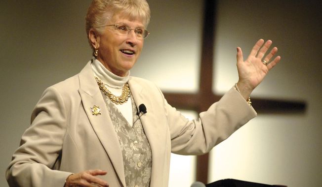 FILE - In this Oct. 15, 2005, file photo, former Montana Gov. Judy Martz addresses a crowd at the Christian Women's Conference at Faith Chapel in Billings, Mont. Martz, Montana's only female governor and lieutenant governor whose fiscal success running the state was overshadowed by scandal and gaffes, died in Butte, Mont., Monday, Oct. 30, 2017. Martz, who had been battling pancreatic cancer, was 74. (James Woodcock/Billings Gazette via AP)