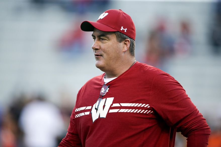 This Oct. 7, 2017 photo shows Wisconsin head coach Paul Chryst following warmups before an NCAA college football game against Nebraska in Lincoln, Neb. The Wisconsin Badgers are wearing week-to-week blinders, College Football Playoff rankings or not. Coach Chryst's immediate concern is getting more consistency on an increasingly banged-up offense. (AP Photo/Nati Harnik)