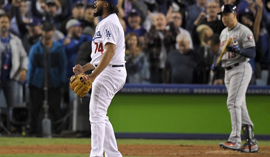 Los Angeles Dodgers relief pitcher Kenley Jansen celebrates after their win against the Houston Astros in Game 6 of baseball's World Series Tuesday, Oct. 31, 2017, in Los Angeles. The Dodgers won 3-1 to tie the series at 3-3.(AP Photo/Mark J. Terrill)