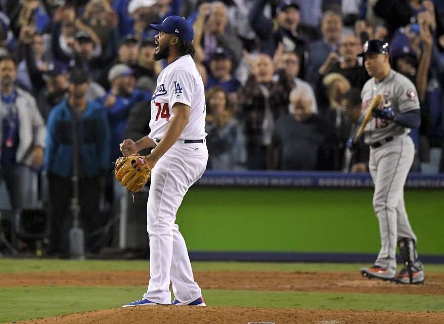Los Angeles Dodgers relief pitcher Kenley Jansen celebrates after their win against the Houston Astros in Game 6 of baseball's World Series Tuesday, Oct. 31, 2017, in Los Angeles. The Dodgers won 3-1 to tie the series at 3-3.(AP Photo/Mark J. Terrill)