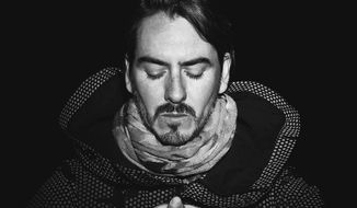 This cover image released by BMG shows &quot;In///Parallel,&quot; the latest release by Dhani Harrison. (BMG via AP)