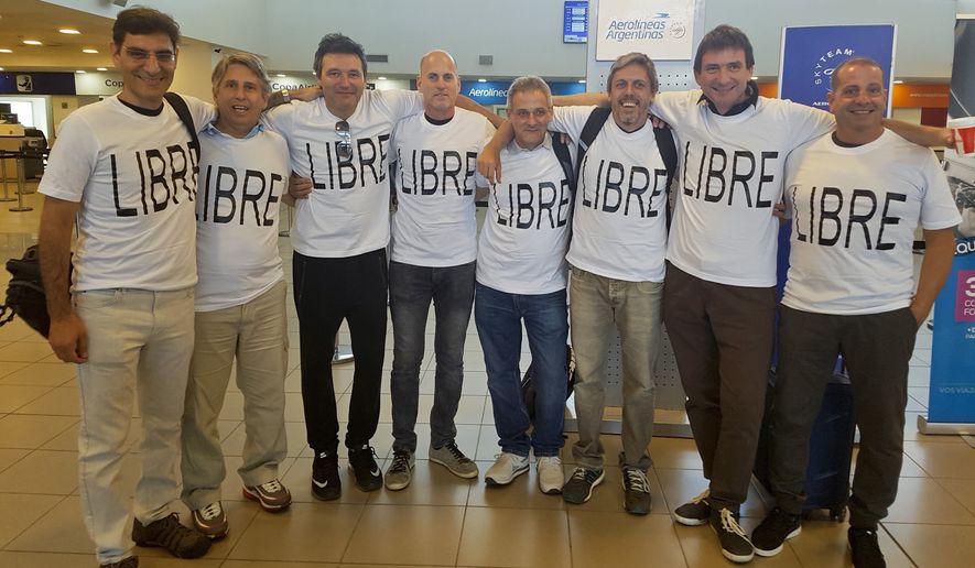 From left: Hernan Ferruchi, Alejandro Pagnucco, Ariel Erlij, Ivan Brajckovic, Juan Pablo Trevisan, Hernan Mendoza, Diego Angelini and Ariel Benvenuto, gathered for a group photo Saturday before their trip to New York City from the airport in Rosario, Argentina. Mr. Mendoza, Mr. Angelini, Mr. Pagnucco, Mr. Erlij and Mr. Ferruchi were killed in the bike path attack near the World Trade Center. They were part of a group of friends celebrating the 30th anniversary of their high school graduation. (Associated Press)