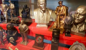In this photo taken on Monday, Oct. 23, 2017, part of the collection of Belarusian Nikolai Pankrat in his private museum in the town of Polatsk, 220 km (137 miles) north of Minsk, Belarus. Pankrat, 63, a retired military man, has assembled a collection more than 10,000 pieces of memorabilia commemorating the Bolshevik leader, including 500 busts, jammed into eye-straining rooms in his home. (AP Photo/Sergei Grits)