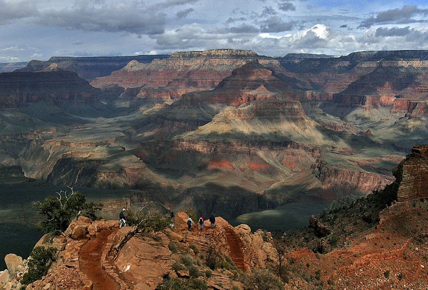 FILE - This Feb. 22, 2005 photo shows the North Rim of Grand Canyon in Arizona. Federal officials are proposing to lift the Obama administration's ban on issuing new mining leases for mining uranium from public land outside Grand Canyon National Park in northern Arizona. The Forest Service's announcement Wednesday, Nov. 1, 2017, of the proposed change responds to President Donald Trump's executive order for federal agencies to eliminate numerous restrictions on energy production. (AP Photo/Rick Hossman,File)