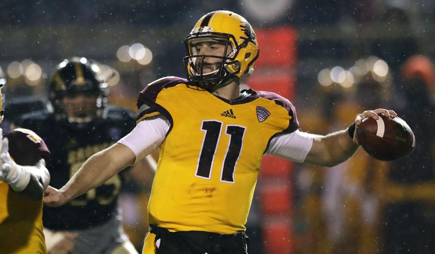 Central Michigan quarterback Shane Morris throws during the first half of an NCAA college football game against Western Michigan, Wednesday, Nov. 1, 2017, in Kalamazoo, Mich. (AP Photo/Carlos Osorio)