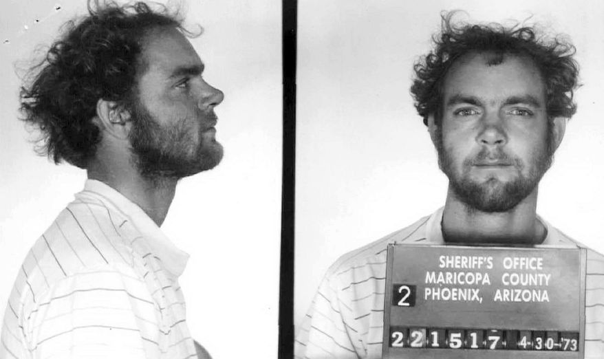 This 1973 booking photo, originally made by the Maricopa County Sheriff's Office in Phoenix and released Thursday, Nov. 2, 2017, by the New Hampshire Office of the Attorney General, shows Terry Peder Rasmussen. Authorities filling in the gaps in the life of Rasmussen, suspected of killing six women and children — including his toddler daughter — want to learn about a woman he was seen with in the 1970s, saying she may be the young girl's mother. Authorities believe that among his victims, he killed an unnamed woman and three girls whose bodies were found in barrels near a New Hampshire state park in 1985 and 2000, and that he fathered one of them. Rasmussen died in a California prison in 2010. (Maricopa County Sheriff's Office/New Hampshire Office of the Attorney General via AP)
