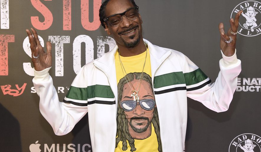 FILE - In this Wednesday, June 21, 2017, file photo, Snoop Dogg arrives at the Los Angeles premiere of &amp;quot;Can&#x27;t Stop, Won&#x27;t Stop: A Bad Boy Story&amp;quot; at the Writers Guild Theater on in Beverly Hills, Calif. An album cover image posted to Snoop Dogg’s Instagram account on Oct. 31, 2017, showing the rapper looking down on what appears to be the dead body of President Donald Trump has been removed from the platform. (Photo by Chris Pizzello/Invision/AP, File)