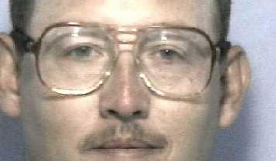 This undated photo released by the Georgia Department of Corrections shows Mark Jason Jones. Georgia's highest court says Jones and two other U.S. servicemen who have been in prison for 25 years for a racially-motivated murder are entitled to a new trial. A unanimous Georgia Supreme Court opinion published Thursday, Nov. 2, 2017, says state prosecutors improperly withheld evidence that would have helped the men's defense. (Georgia Department of Corrections via AP)