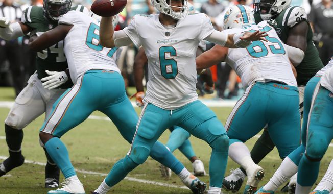 In this Oct. 22, 2017, photo, Miami Dolphins quarterback Jay Cutler (6) looks to pass, during the first half of an NFL football game against the New York Jets in Miami Gardens, Fla. The Raiders play at Miami on Sunday night, and both teams are reeling. The Raiders have lost five of their past six games, including a 34-14 thumping last Sunday at Buffalo. The Dolphins are coming off a 40-0 loss at Baltimore, their worst defeat in 20 years. (AP Photo/Wilfredo Lee)