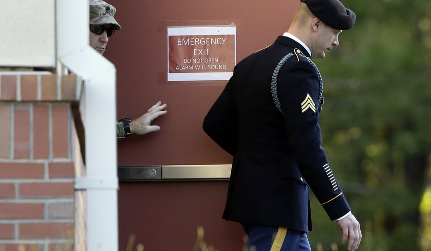 Army Sgt. Bowe Bergdahl, right, leaves the Fort Bragg courtroom facility as the judge deliberates in a sentencing hearing at Fort Bragg, N.C., Friday, Nov. 3, 2017. Bergdahl, who walked off his base in Afghanistan in 2009 and was held by the Taliban for five years, pleaded guilty to desertion and misbehavior before the enemy. (AP Photo/Gerry Broome)