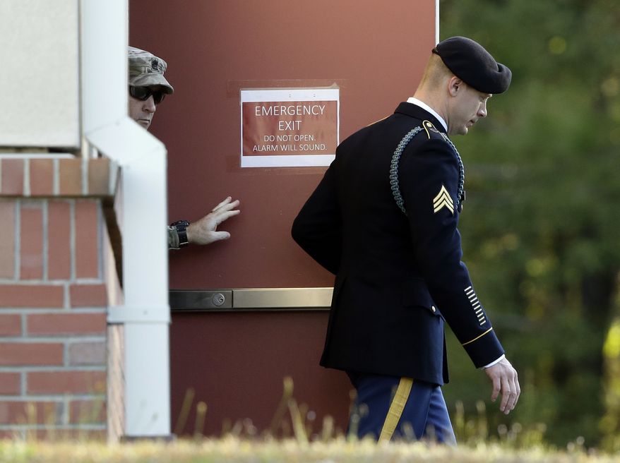 Army Sgt. Bowe Bergdahl, right, leaves the Fort Bragg courtroom facility as the judge deliberates in a sentencing hearing at Fort Bragg, N.C., Friday, Nov. 3, 2017. Bergdahl, who walked off his base in Afghanistan in 2009 and was held by the Taliban for five years, pleaded guilty to desertion and misbehavior before the enemy. (AP Photo/Gerry Broome)