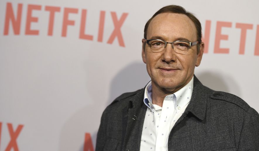 FILE - In this April 27, 2015 file photo, Kevin Spacey arrives at the Q&amp;A Screening of &quot;The House Of Cards&quot; at the Samuel Goldwyn Theater in Beverly Hills, Calif. Netflix says Spacey is out at &quot;House of Cards&quot; after a series of allegations of sexual harassment and assault. Netflix says in a statement Friday night, Nov. 3, 2017, that it&#39;s cutting all ties with Spacey, and will not be involved with any further production of &quot;House of Cards&quot; that includes him.  (Photo by Jordan Strauss/Invision/AP, File)