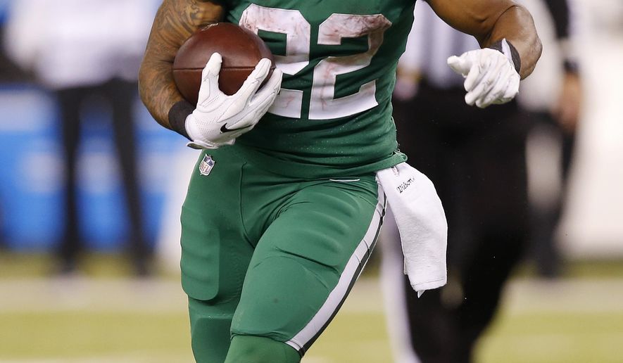 New York Jets running back Matt Forte carries for a touchdown against the Buffalo Bills during the second half of an NFL football game, Thursday, Nov. 2, 2017, in East Rutherford, N.J. (AP Photo/Kathy Willens)