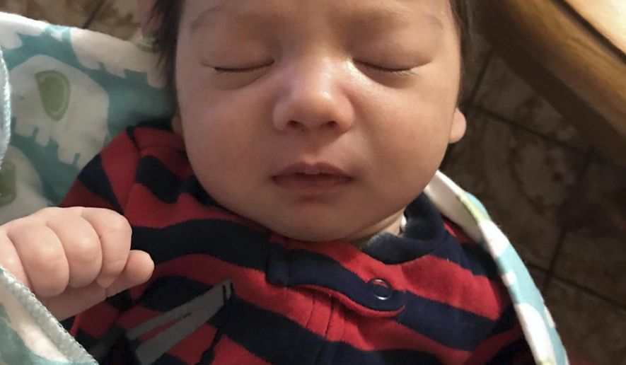 This undated photo released by the Los Angeles County Sheriff's Department shows two-month-old Jefferson Gomes, the subject of a Southern California Amber Alert. Authorities say his father, Jeffrey Michael Gomes, a 42-year-old man of Asian descent, has abducted his son and is considered armed and dangerous. The alert says the father and baby were last seen Friday afternoon, Nov. 3, 2017, in Fort Tejon, an area on the Grapevine section of Interstate 5 about halfway between Los Angeles and Bakersfield. (Los Angeles County Sheriff's Department via AP)
