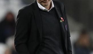 West Ham manager Slaven Bilic watches the English Premier League soccer match between West Ham and Liverpool at the London Stadium in London, Saturday, Nov. 4, 2017. (AP Photo/Kirsty Wigglesworth)